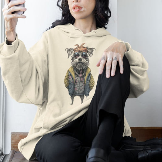 Person wearing a beige hoodie with a graphic of a dog in sunglasses and a jacket.
