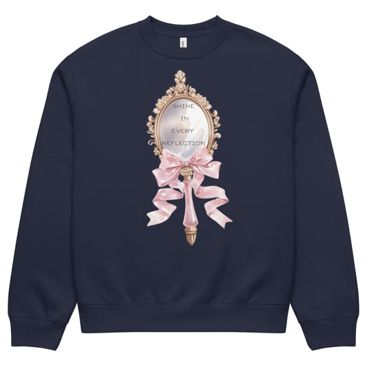 Navy blue sweatshirt with a decorative mirror and pink bow design on a white background