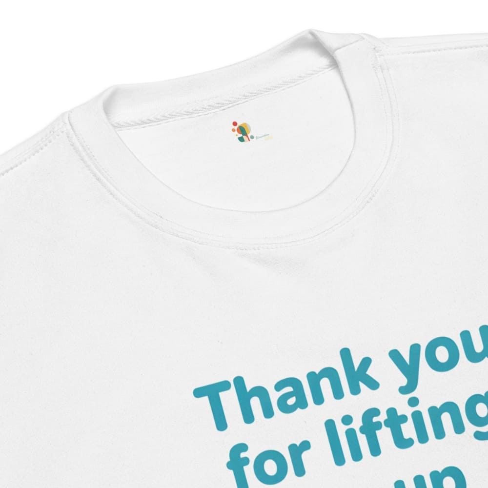 White shirt with blue text 'Thank you for lifting up' on a white background