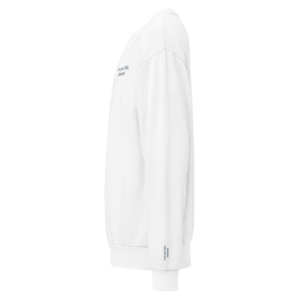 White sweatshirt with brand logo on sleeve against a white background
