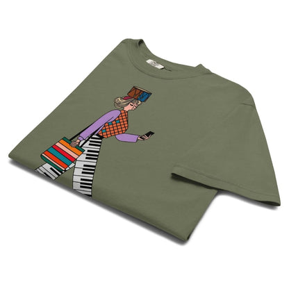 Moss green t-shirt with colorful graphic design on a white background
