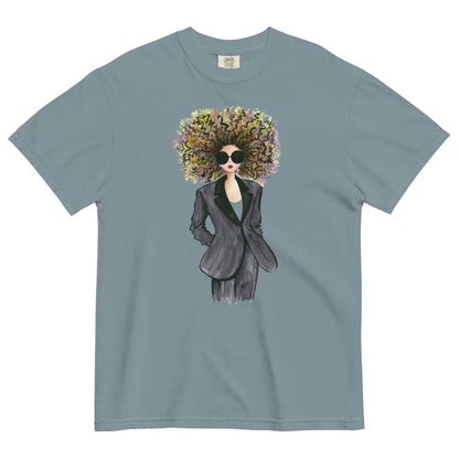 Ice-blue t-shirt with a graphic of a woman with a floral afro and sunglasses on a white background