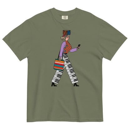 Moss green t-shirt with a colorful graphic of a person walking on a white background