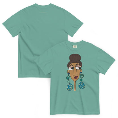 Green t-shirt with a graphic of a woman's face and earrings on a white background
