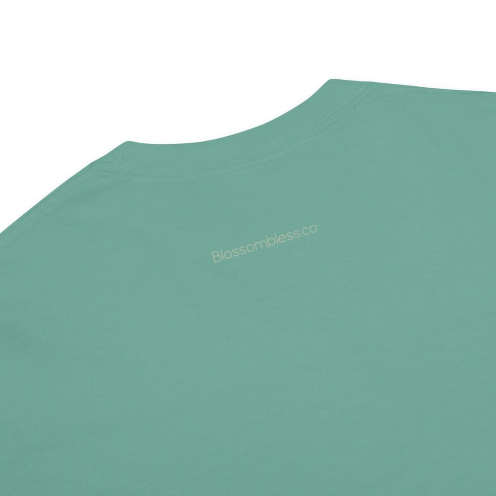 Close-up of a green t-shirt on a white background