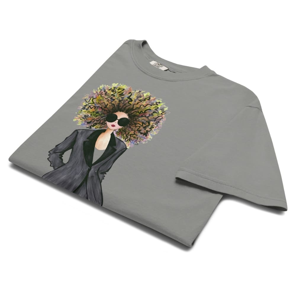 Gray t-shirt with a graphic of a woman with flowers in her hair on a white background