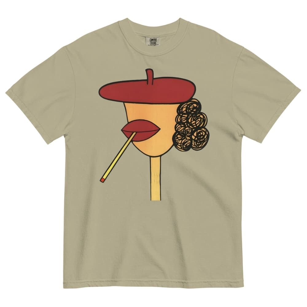 Khaki t-shirt with a stylized face design featuring a red beret, yellow face, and black hair on a white background.