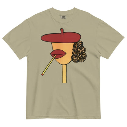 Khaki t-shirt with a stylized face design featuring a red beret, yellow face, and black hair on a white background.