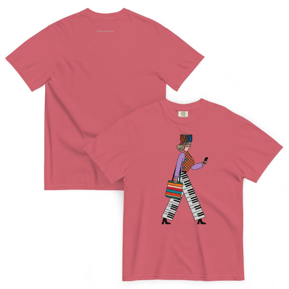 Watermelon red t-shirt with a graphic design of a person walking on the front, displayed against a white background.