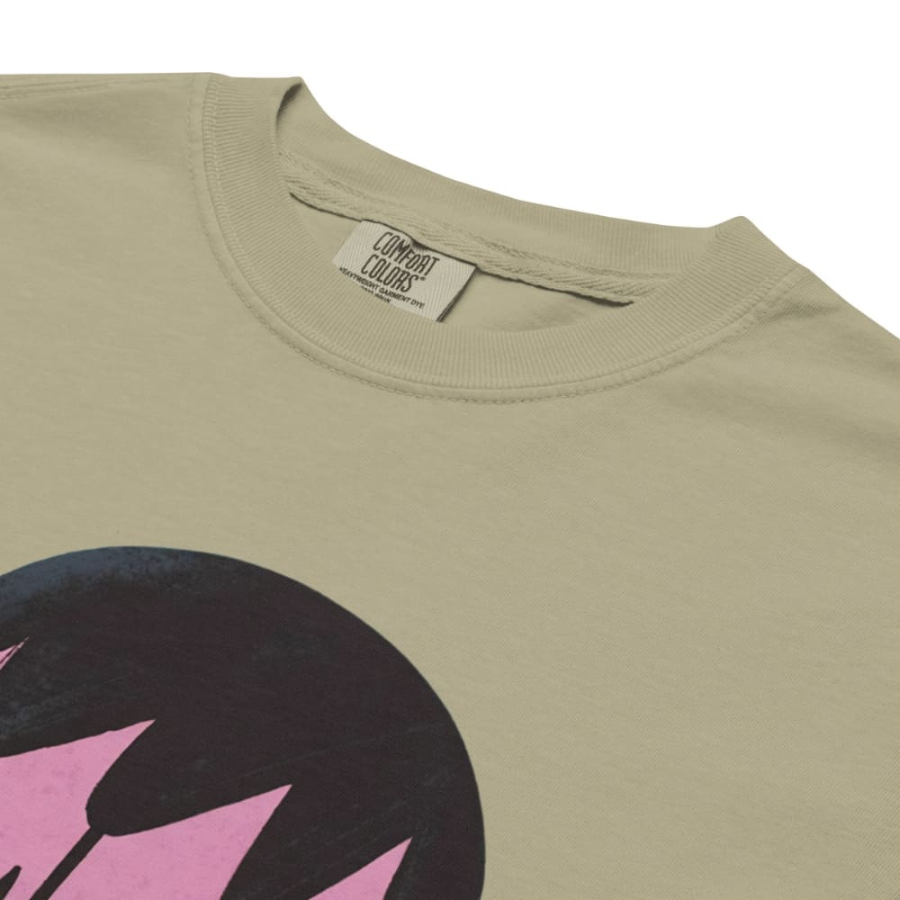 Khaki t-shirt with a large black and pink graphic on a white background