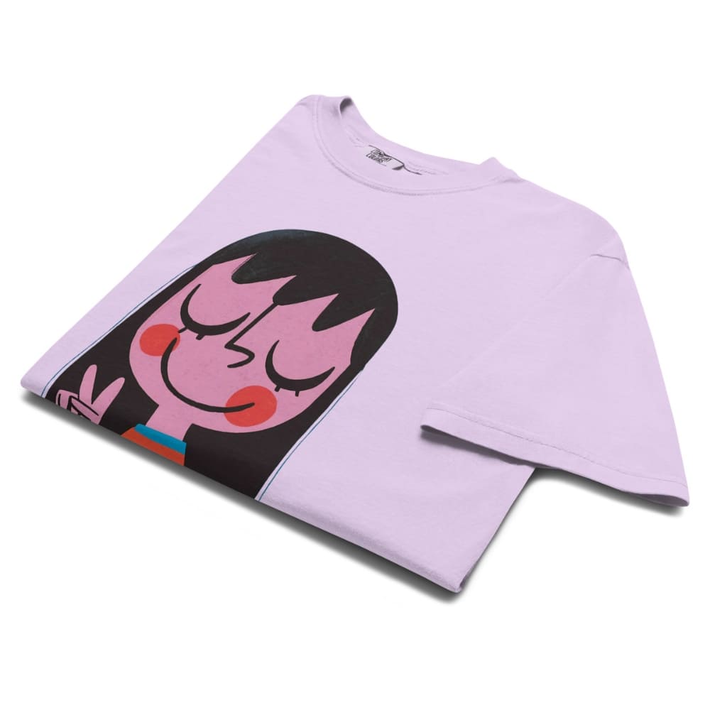 Light purple t-shirt with a cartoon face design on a white background