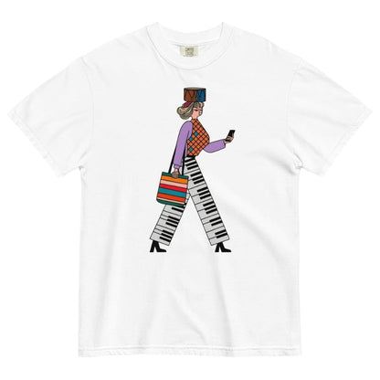 White t-shirt with a colorful graphic of a person walking and holding a phone on a white background