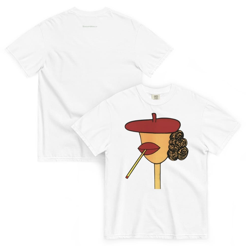 White t-shirt with a graphic design of a face wearing a red beret, yellow lipstick, and black hair on a white background.