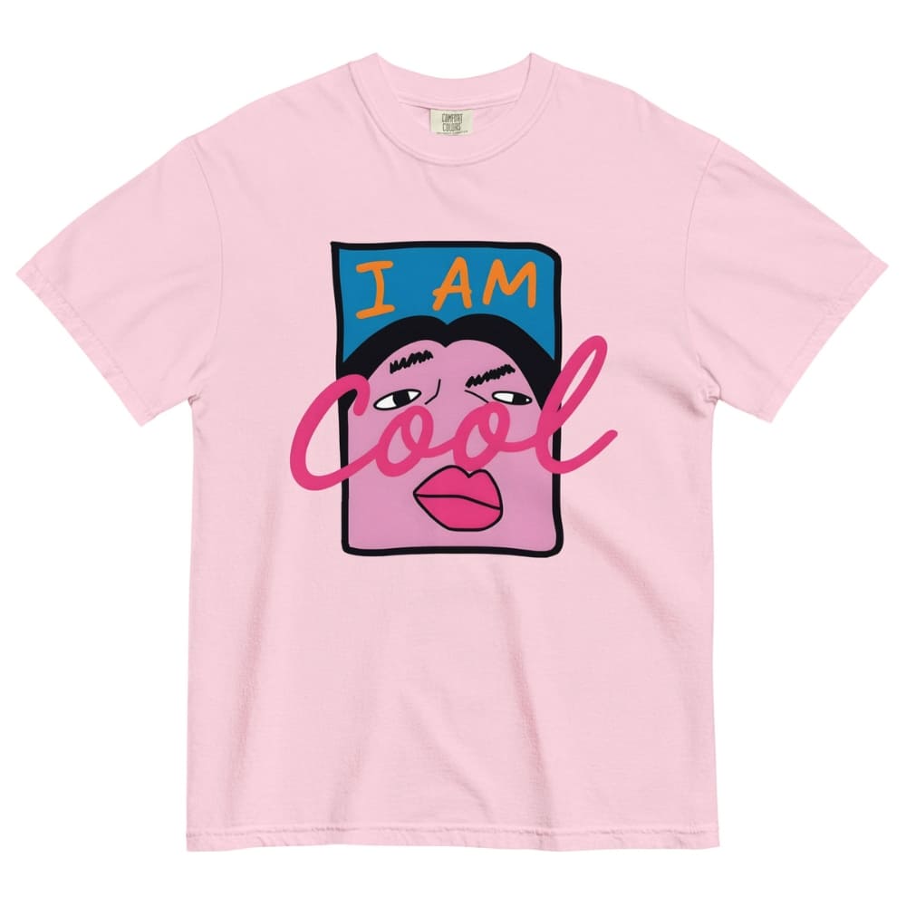 Pink t-shirt with a graphic design of a face and 'I AM Cool' text on a white background