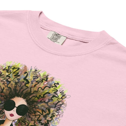 Blossom-pink t-shirt with a colorful graphic of a woman's face and hair, featuring the 'Comfort Colors' brand label.