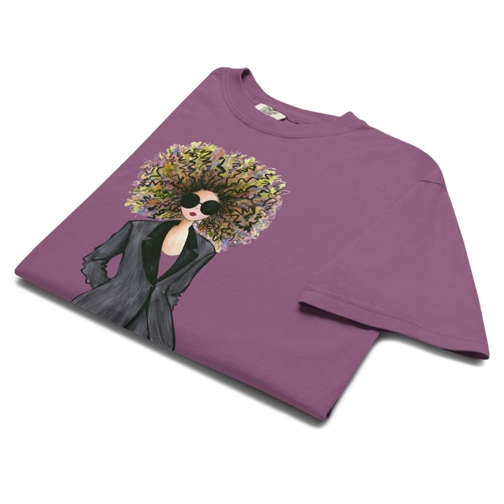 Berry-purple t-shirt with a graphic of a woman with a floral hairstyle on a white background