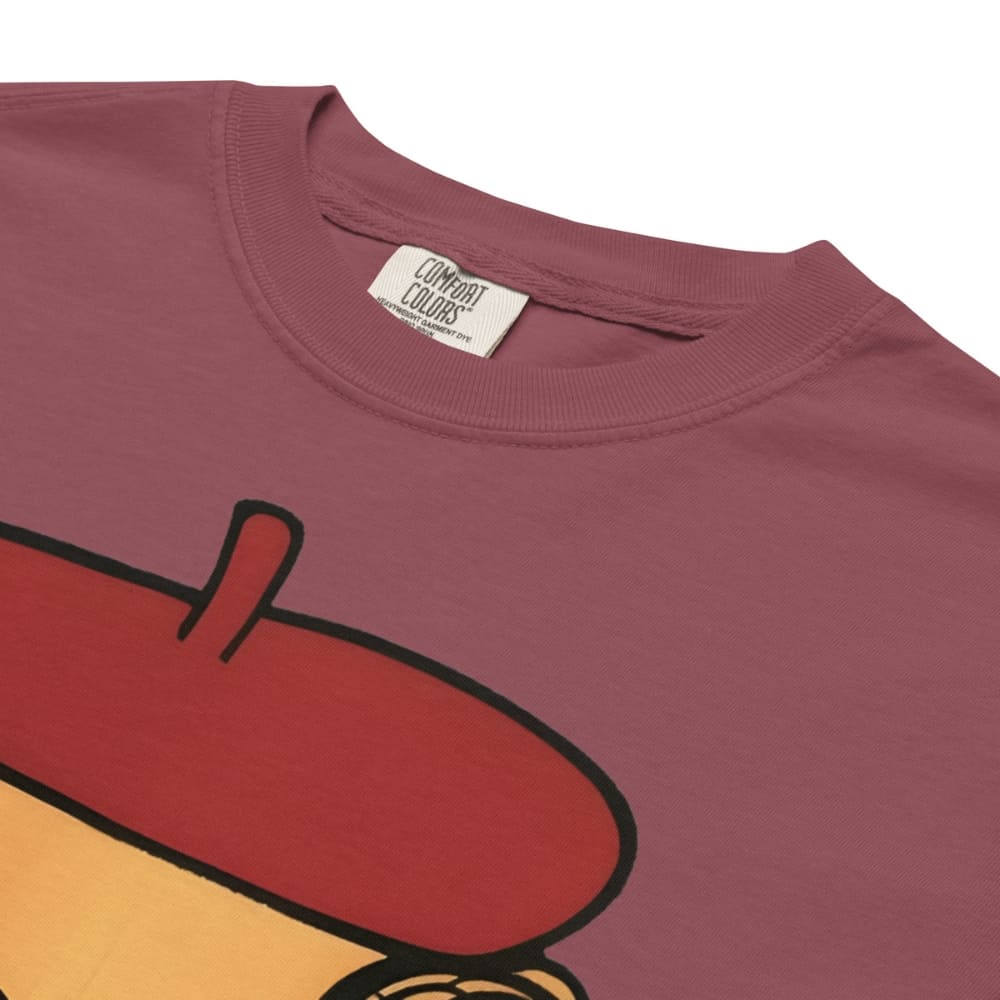 Brick t-shirt with a graphic design of a red hat and yellow face, featuring 'Comfort Colors' label.