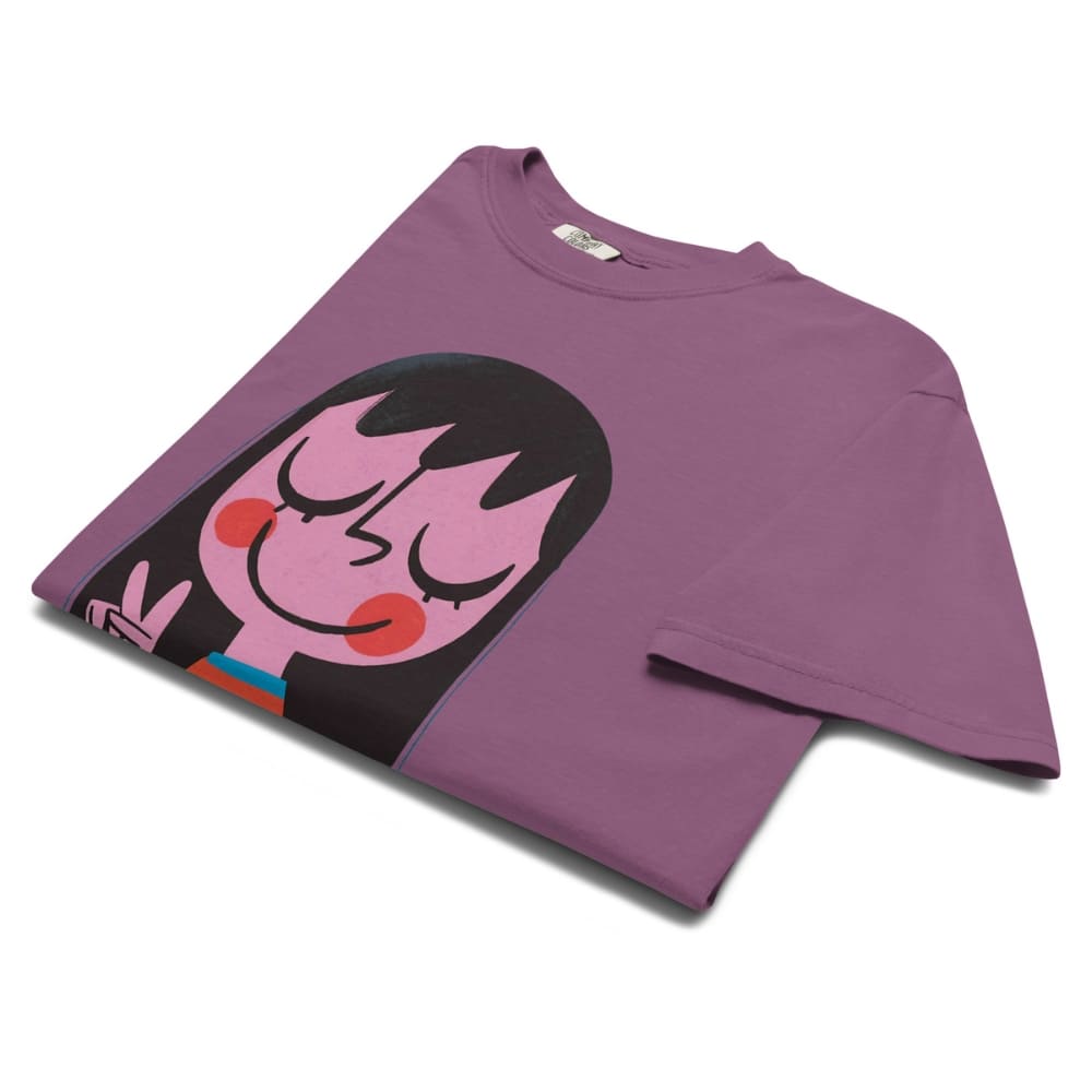Purple t-shirt with a cartoon character design on a white background