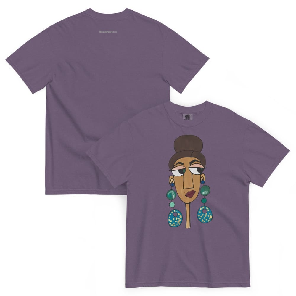 Grape purple t-shirt with a graphic of a woman's face and earrings on a white background