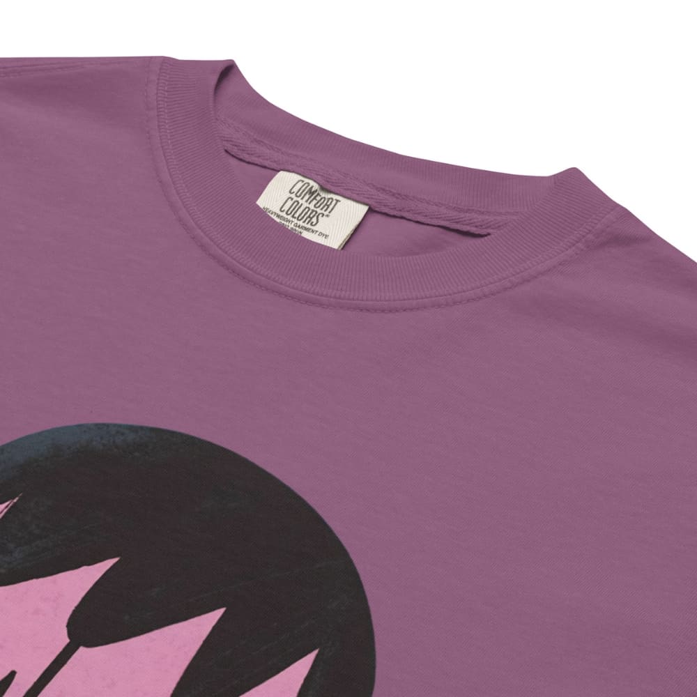 Purple t-shirt with a black and pink graphic design on a white background