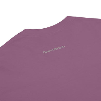 Close-up of a berry purple t-shirt on a white background