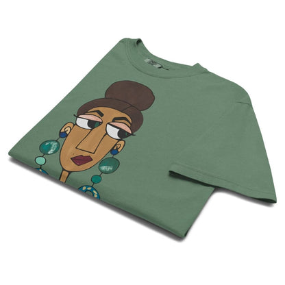 Green t-shirt with a graphic of a stylized face on a white background