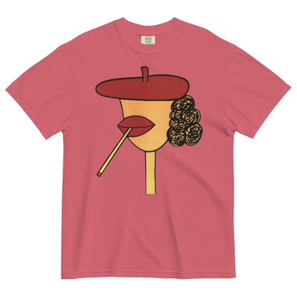 Wtermelon-pink t-shirt with a stylized face design featuring a red beret, yellow face, black hair, and red lips on a white background.