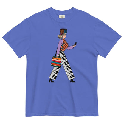 Flo blue t-shirt with a colorful graphic of a person walking and using a phone on a white background