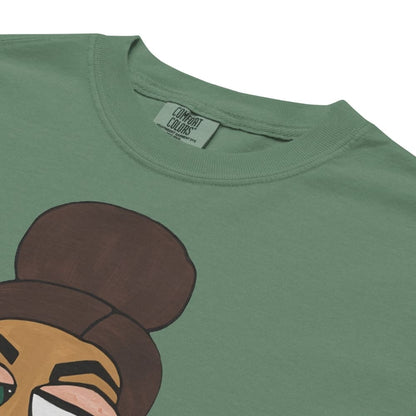 Green t-shirt with a cartoon character design on a white background