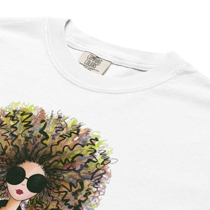 White t-shirt with a colorful graphic of a person with a large afro and sunglasses, featuring the brand 'Comfort Colors'.