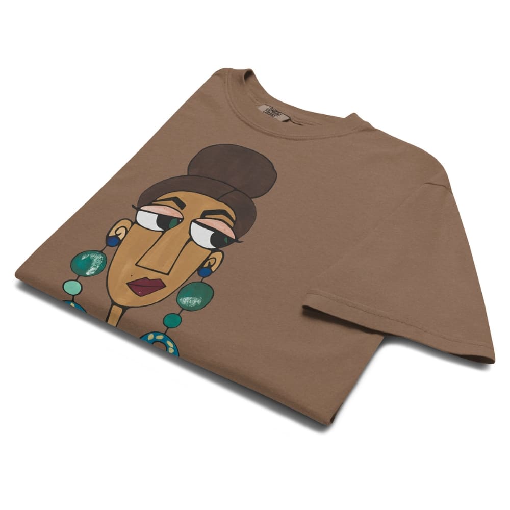 Brown t-shirt with a graphic of a stylized face on a white background