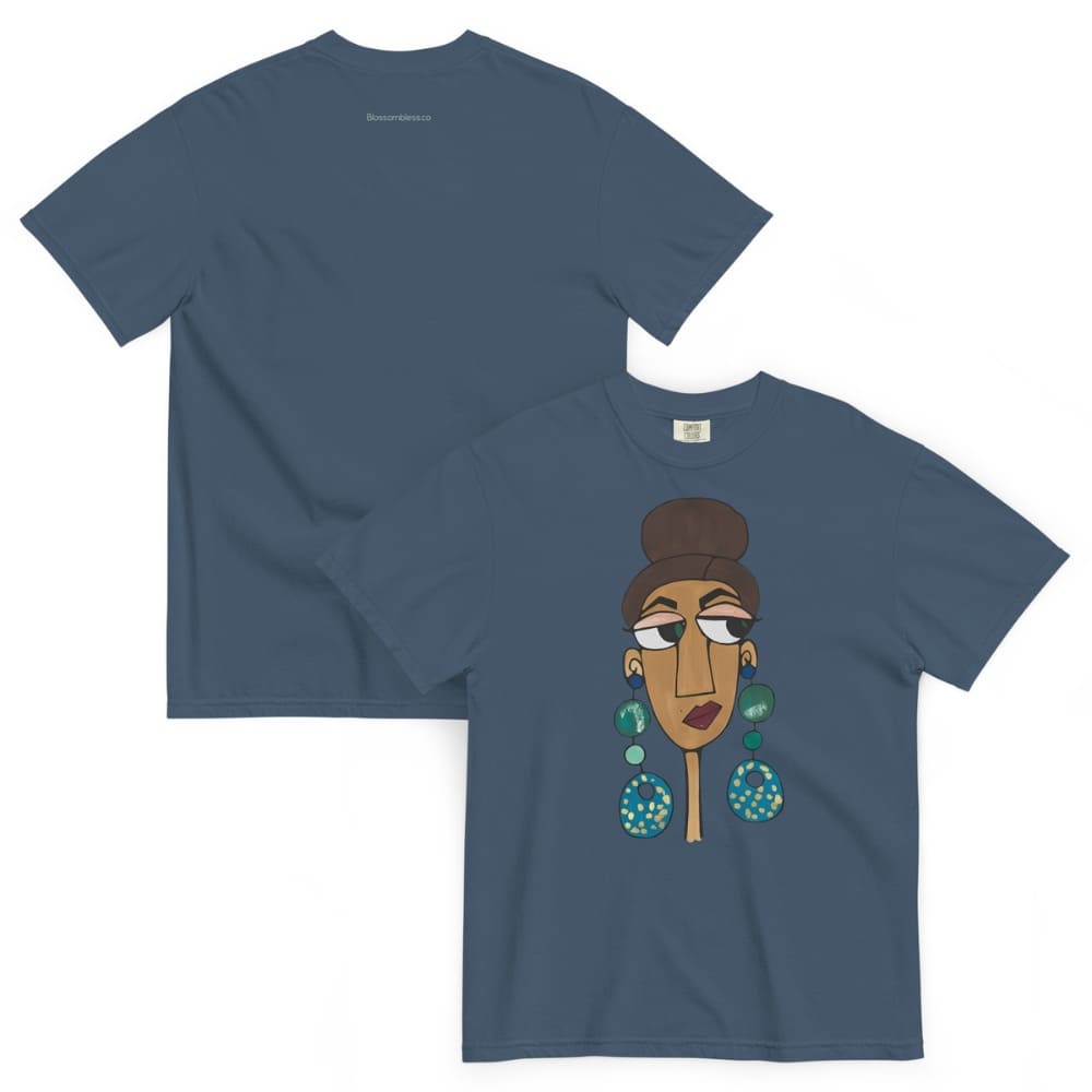 Mid-night blue t-shirt with a graphic of a woman's face and earrings on a white background