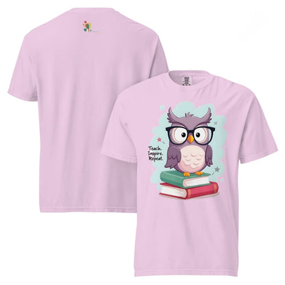 Cute purple owl with glasses sitting on stacked books, with quote "Teach. Inspire. Repeat." – printed on a teacher t-shirt