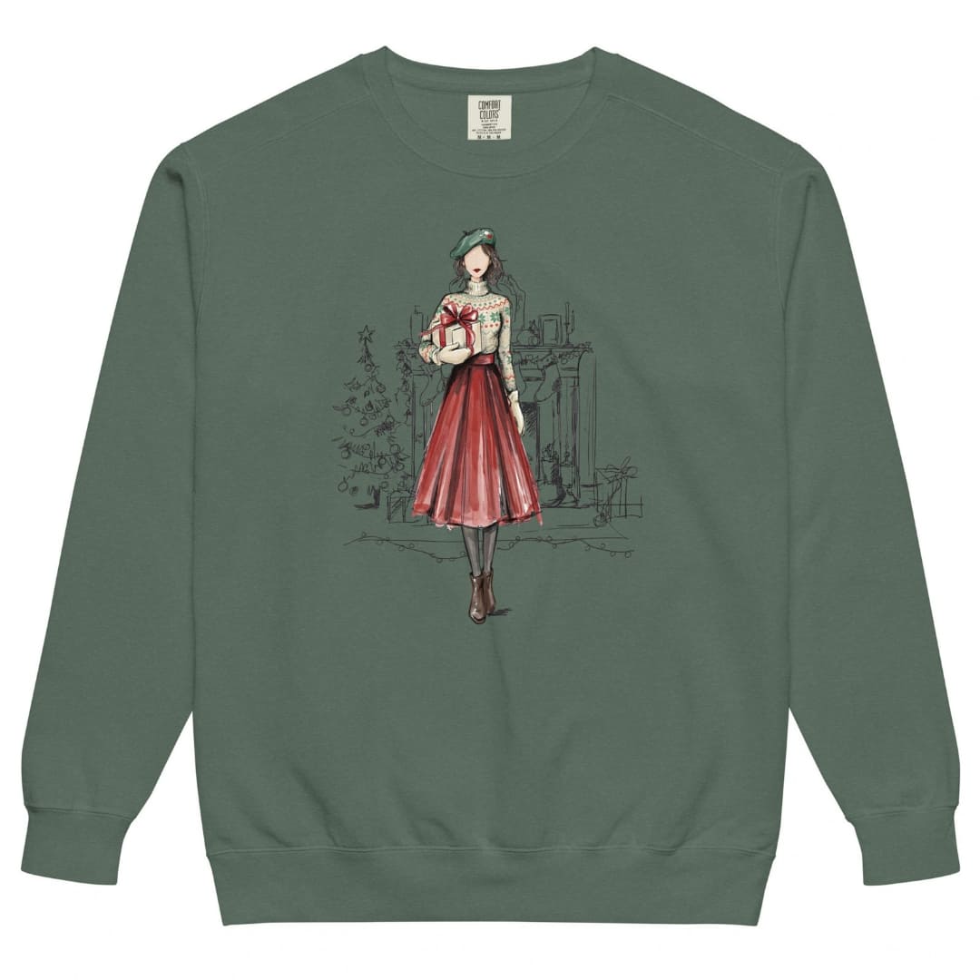 Holiday Muse™ sweatshirt by Blossombless.co in Blue Spruce, front view: a sketch-style watercolor illustration of a faceless woman in a green beret, Fair Isle sweater and red pleated skirt holding a wrapped gift, with a loosely sketched fireplace and Christmas tree behind her