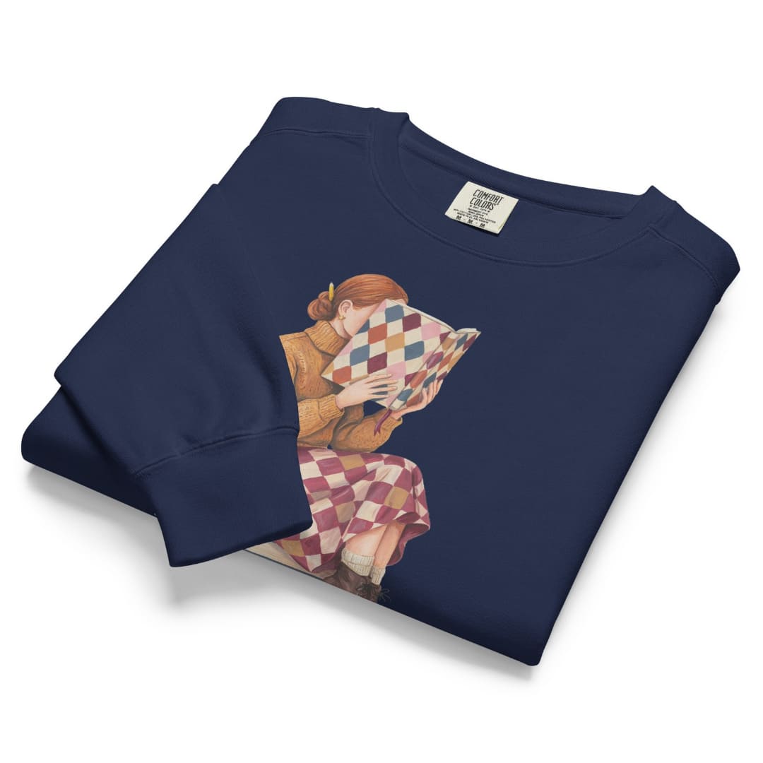 Between Chapters™ sweatshirt by Blossombless.co in True Navy, folded to show the heavyweight fleece and the painterly reading graphic