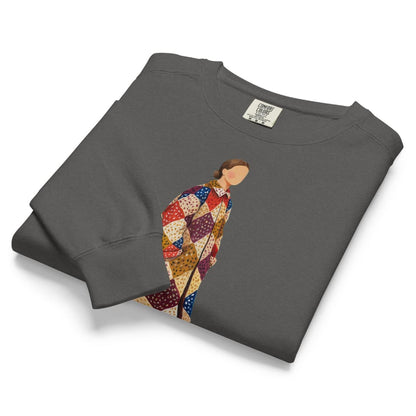 Pieced Together™ sweatshirt by Blossombless.co in Pepper, folded to show the heavyweight fleece and the patchwork coat graphic