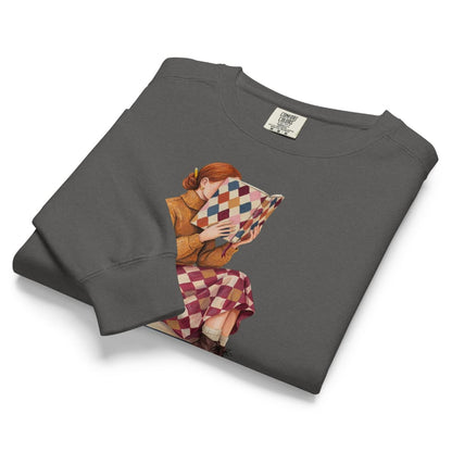 Between Chapters™ sweatshirt by Blossombless.co in Pepper, folded to show the heavyweight fleece and the painterly reading graphic
