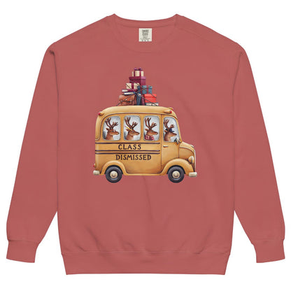 Class Dismissed™ sweatshirt by Blossombless.co in Crimson, front view: painterly golden school bus with reindeer in the windows, gifts, books and a leather satchel tied to the roof, and CLASS DISMISSED painted on the side
