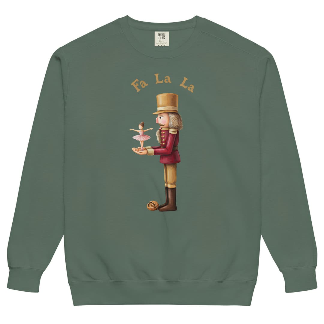 Pas de Deux™ Nutcracker ballet Christmas sweatshirt in Blue Spruce, front: a painterly nutcracker holding a tiny ballerina under gold Fa La La