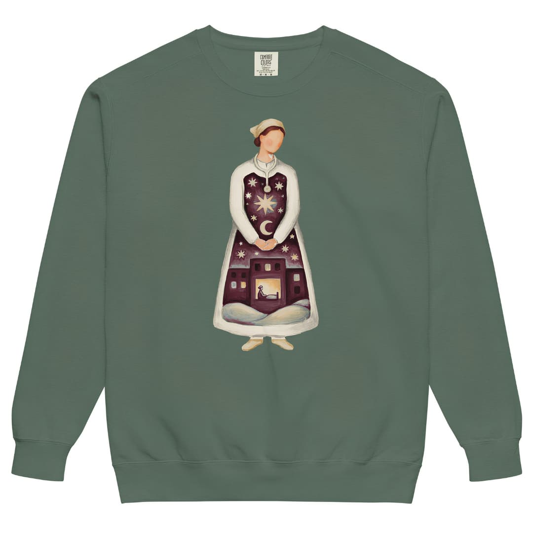 Keeping Watch™ Christmas night shift nurse sweatshirt in Blue Spruce, front view, painterly nurse holding a starry winter night on a Comfort Colors 1566 crewneck