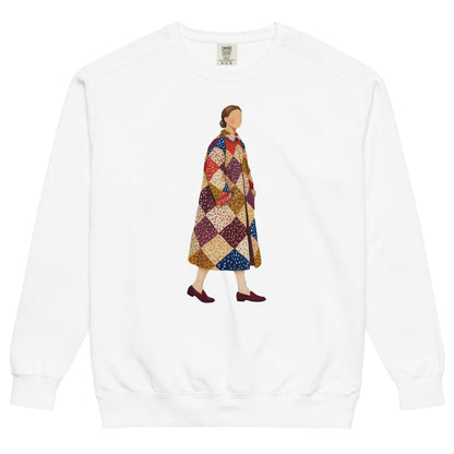 Pieced Together™ sweatshirt by Blossombless.co in White, front view: a hand-painted faceless woman walking in an oversized patchwork coat of burgundy, mustard, cream, red and navy diamonds