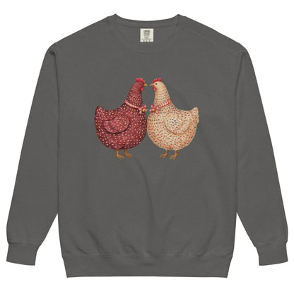 Belle & Plume™ sweatshirt by Blossombless.co in Pepper, front view: two painterly French hens, one burgundy and one cream, beak to beak with striped ribbon bows and tiny gold bells