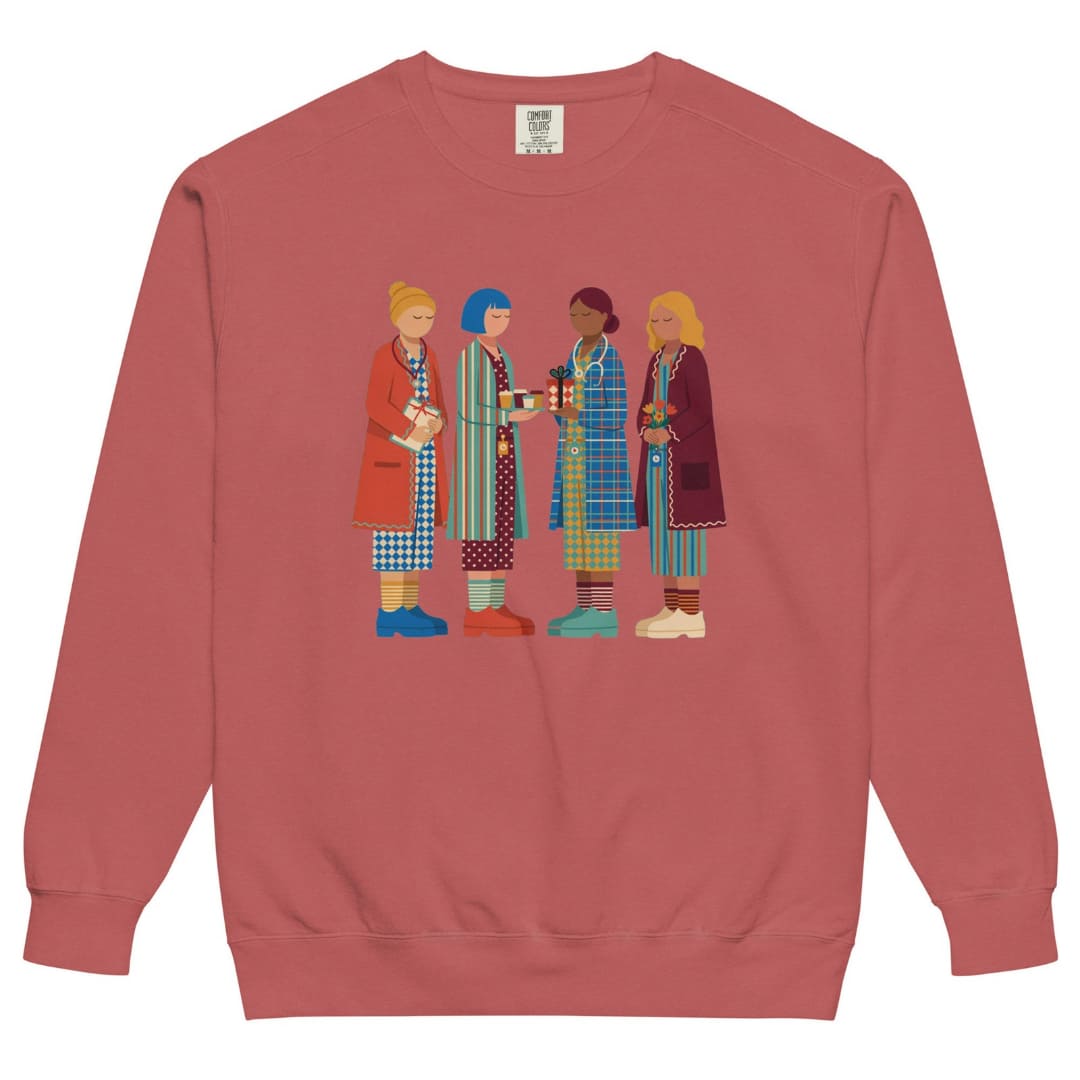 Holiday Handoff™ sweatshirt by Blossombless.co in Crimson, front view: four nurses in patterned coats and striped compression socks trading coffee and a wrapped gift