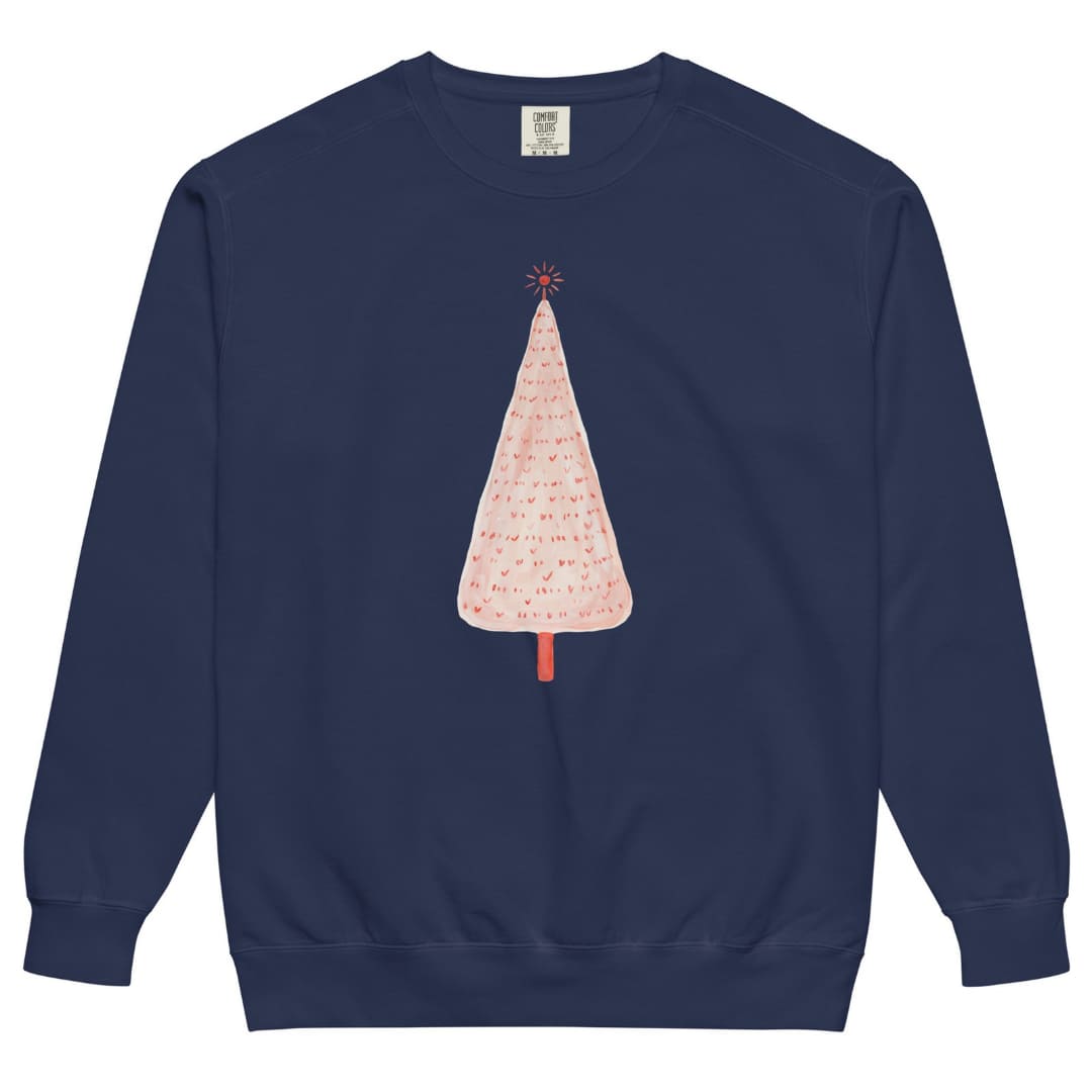 Pink Pine™ sweatshirt by Blossombless.co in True Navy, front view: a slim blush-pink Christmas tree with a painterly texture, tiny red marks and a small red star