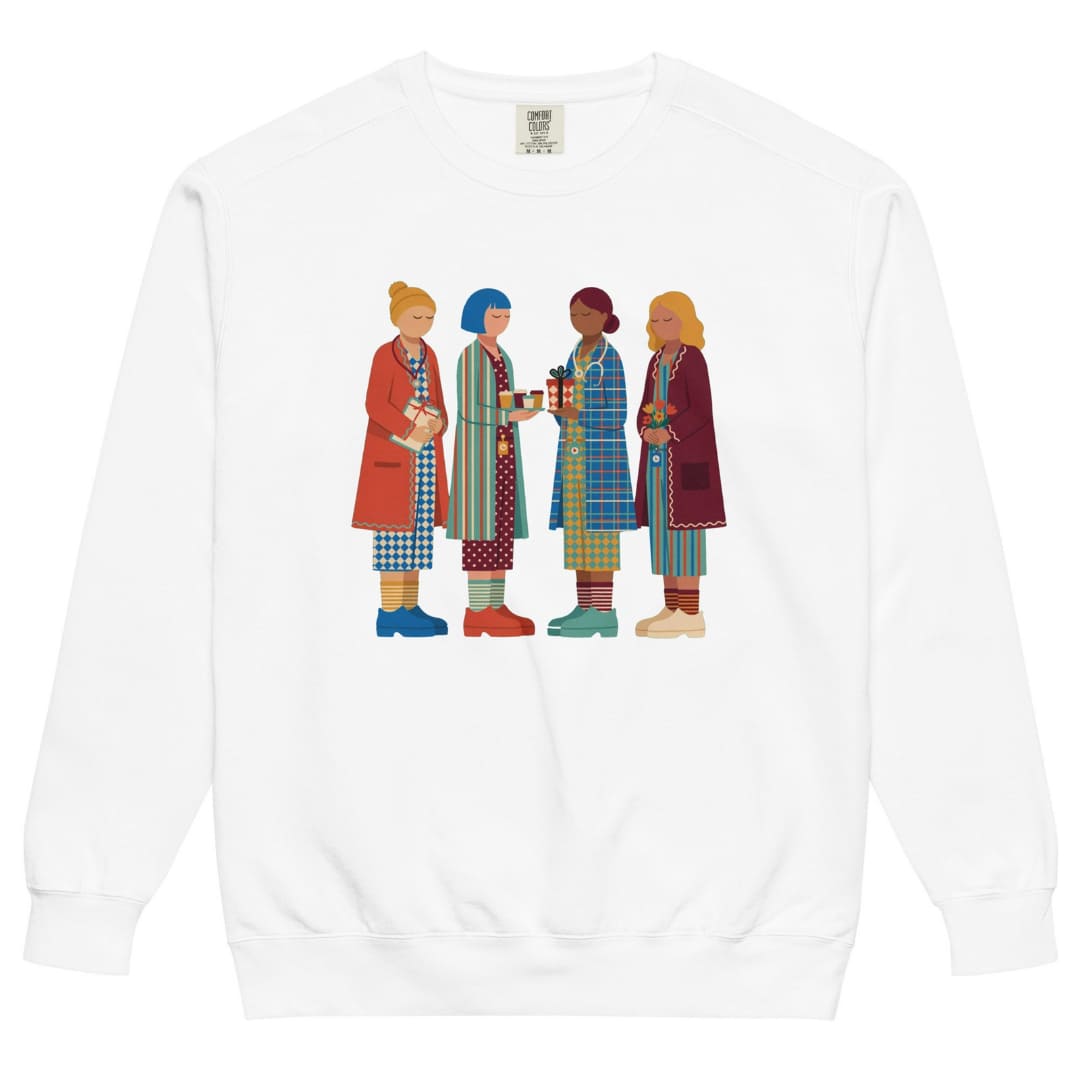 Holiday Handoff™ sweatshirt by Blossombless.co in White, front view: four nurses in patterned coats and striped compression socks trading coffee and a wrapped gift