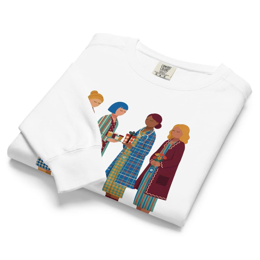 Holiday Handoff™ sweatshirt by Blossombless.co in White, folded to show the heavyweight fleece and nurses graphic