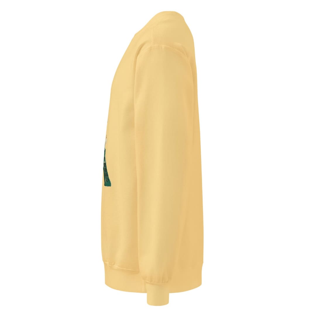 Tour de Noël™ sweatshirt in Butter, side view showing the relaxed fit and ribbed cuff