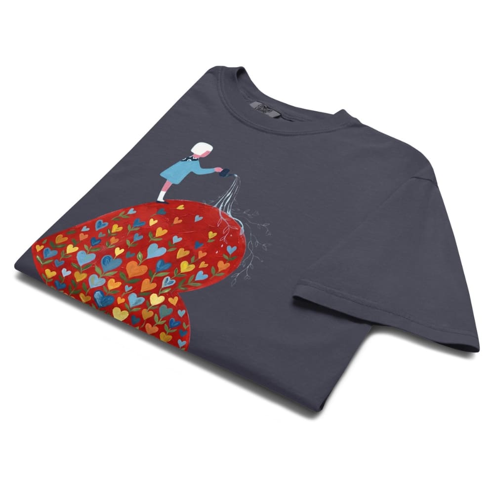 Navy blue t-shirt with a colorful heart design and character on a white background