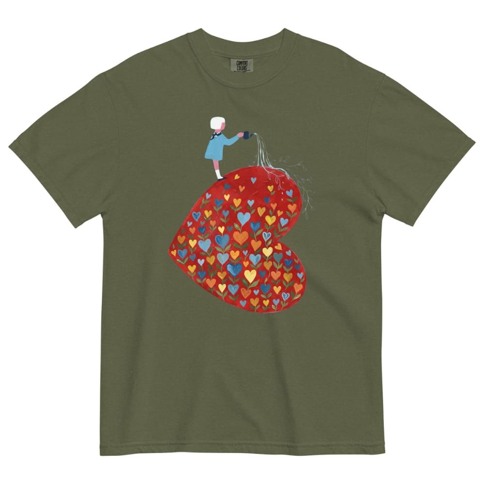 Hemp green t-shirt with a colorful heart design and a person standing on it.