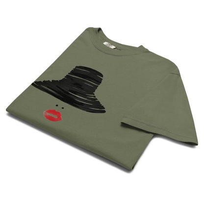 Moss green t-shirt with black witch hat and red lips graphic on a white background